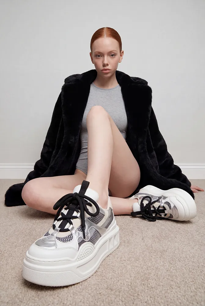AI footwear advertising still — Mia in sneakers, Filmatix campaign