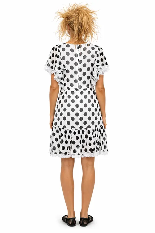 AI on-model e-commerce — Arina in polkadot dress, back view, Filmatix