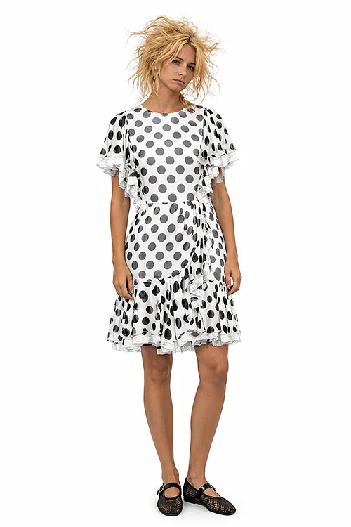 AI on-model e-commerce — Arina in polkadot dress, front view, Filmatix