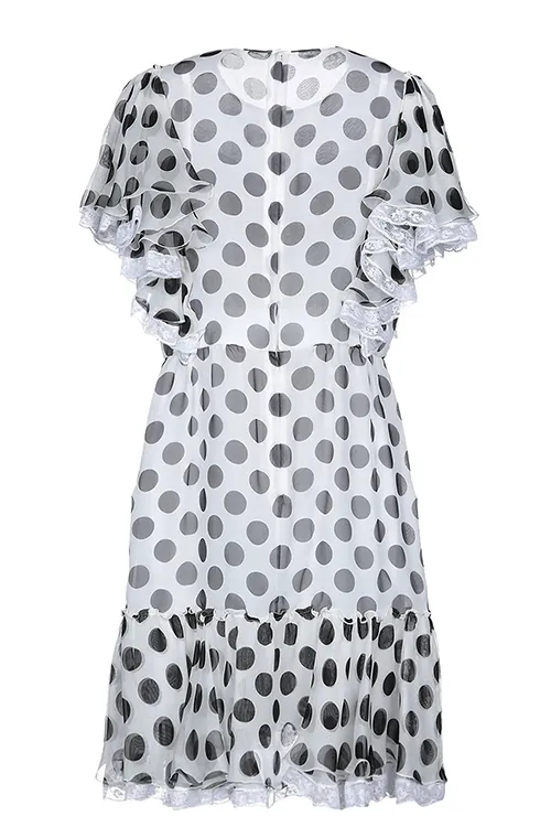AI e-commerce — polkadot dress product shot, back view, Filmatix studio
